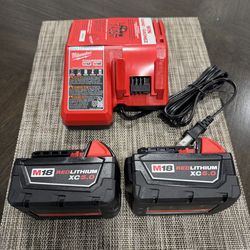 2 Milwaukee M18 XC5.0 battery and  charger new