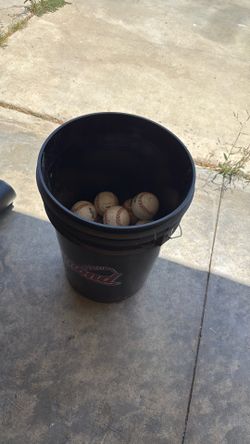 Bucket of baseballs/softballs