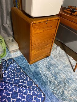 Sturdy wooden file cabinet with two large drawers