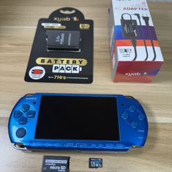 Blue PSP 3000 With 100 Games Installed.             S96