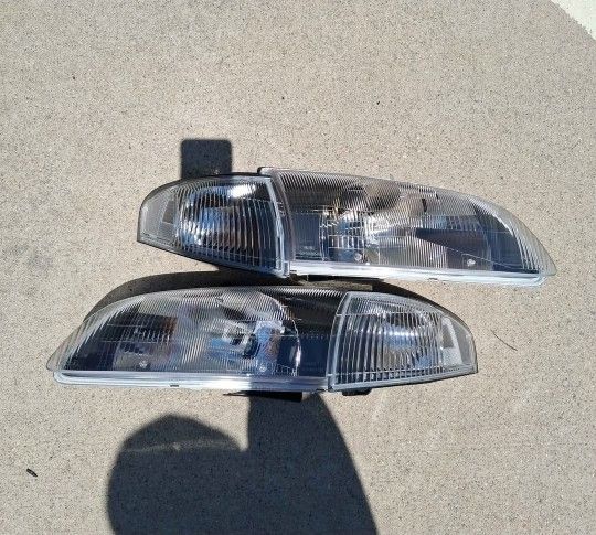 98-99 Mazda 626 Headlights Faros Calaveras Micas Luces