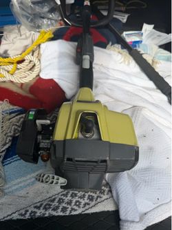 Ryobi expansit.  Long straight trimmer  takes attachments