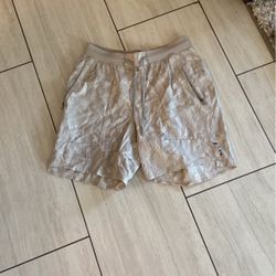 Men’s Lululemon running shorts, size large