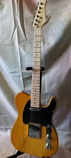 Brand new telecaster electric guitar with new bag and cable