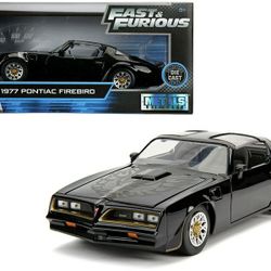 Tego’s 1977 Pontiac Firebird Black "Fast & Furious" Movie 1/24 Diecast Model Car by Jada