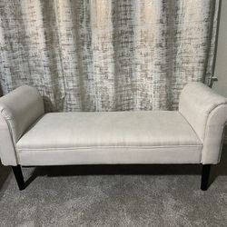 Beige upholstered bench: