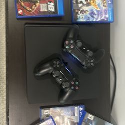 PS4 With 2 Controllers And Games