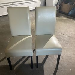 Two Leather Chairs 