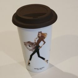 Henri Bendel New York Ceramic Travel Mug Tumbler With Lid Shopper Girl & 
Dog. New, no tags, perfect. The mug is made of ceramic or bone china. It 
st