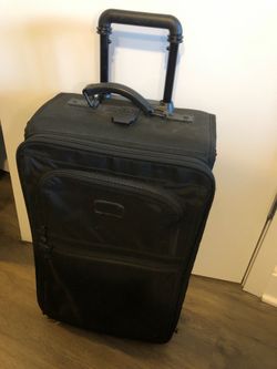 Tumi Rolling carry on suitcase wheel