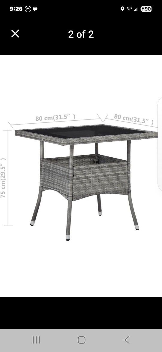 Gray wicker table with glass top 