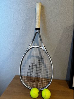 Tennis racket and balls