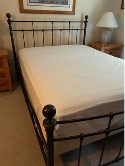 Brass bed Queen size.
