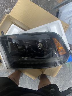BOTHH!!!2014 ram Headlights!!! Great Condition Need Gone ASAP 