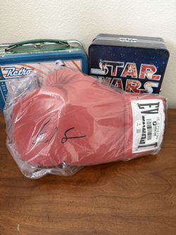 Autographed Boxing Glove And UFC shorts