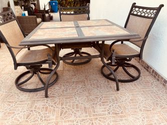 Outdoor dining table with four