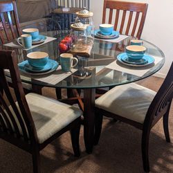 Glass Dining Table With Wood Distressed Chairs 