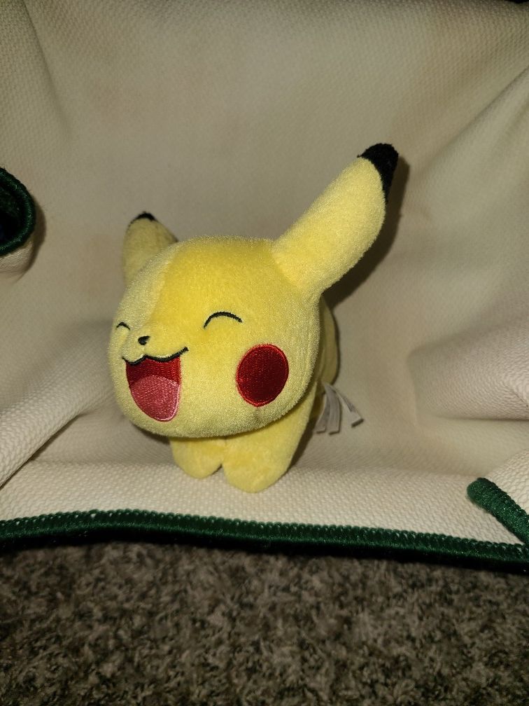 TOMY pikachu stuffed animal