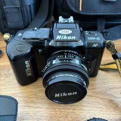 Nikon F401,Nikkor 50mm F/1.8,Nikkor 28mm F/2.8,Nikkor 35-135mm,Speedlight 15