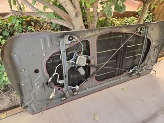 Tundra 1st gen rear power window guide with motor.