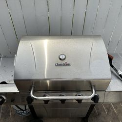 Char Broil Stainless Steel Gas Grill with Cart Wheels and  with Side Burner.