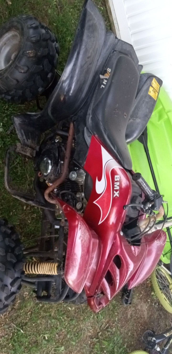 Red BMX Four Wheeler