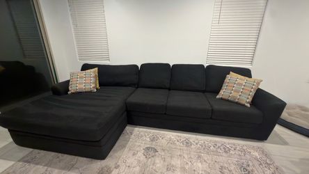 12-Foot Black Sectional Couch w/ Pillows