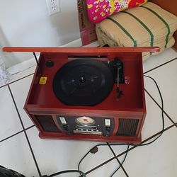 victrola record player,CD player,tape player and am and fm stereo