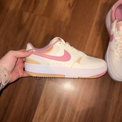 Pink & white Nike Court