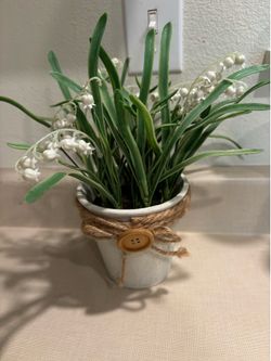 Artificial Lillie’s of the valley plant in a distressed with pot
