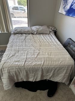 Full size bed with mattress topper and frame