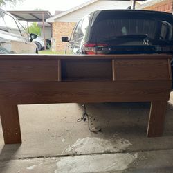 Headboard with two sliding doors;