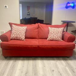 Barely Used Red Sofa with Pull-Out Queen Bed