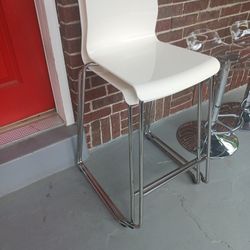 2 Chrome And White Chairs