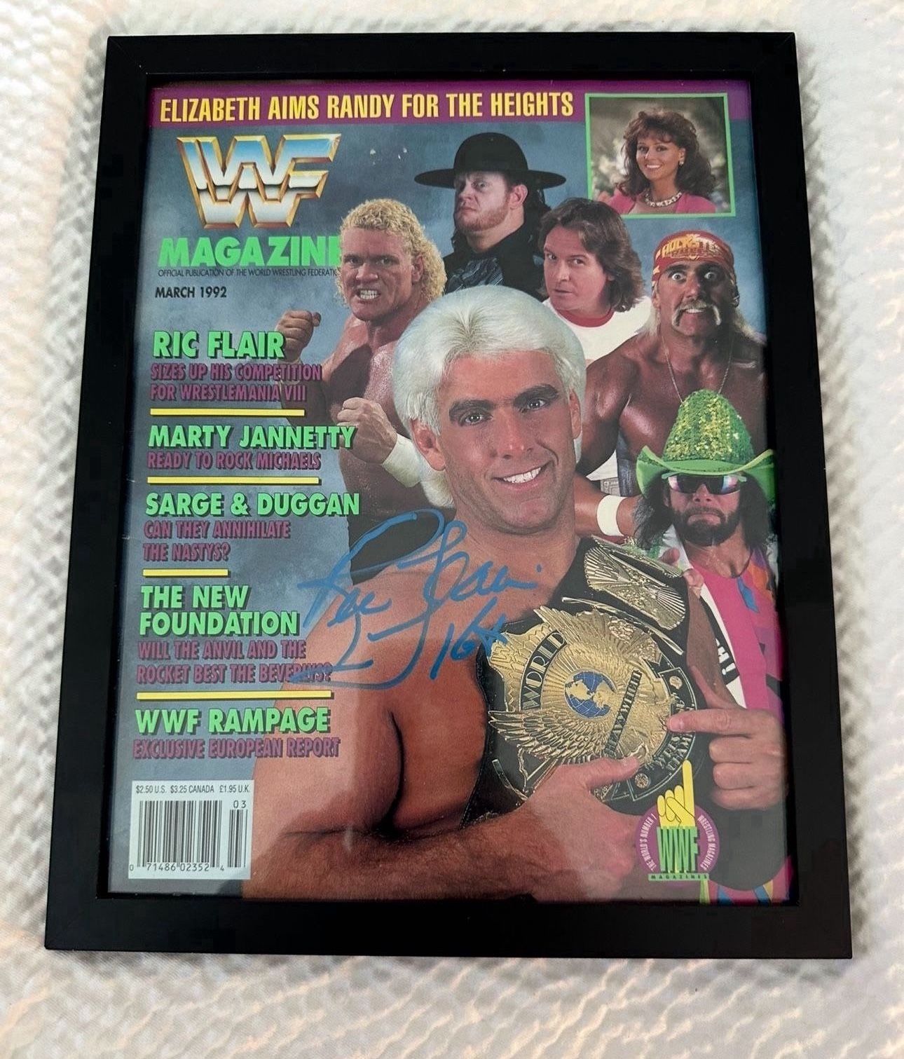 RARE WWF MAGAZINE AUTOGRAPHED BY RIC FLAIR, WWE