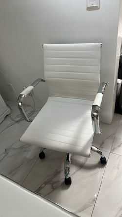 White comfortable office chair with wheels