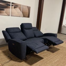 Power reclining sofa with adjustable headrests and USB port