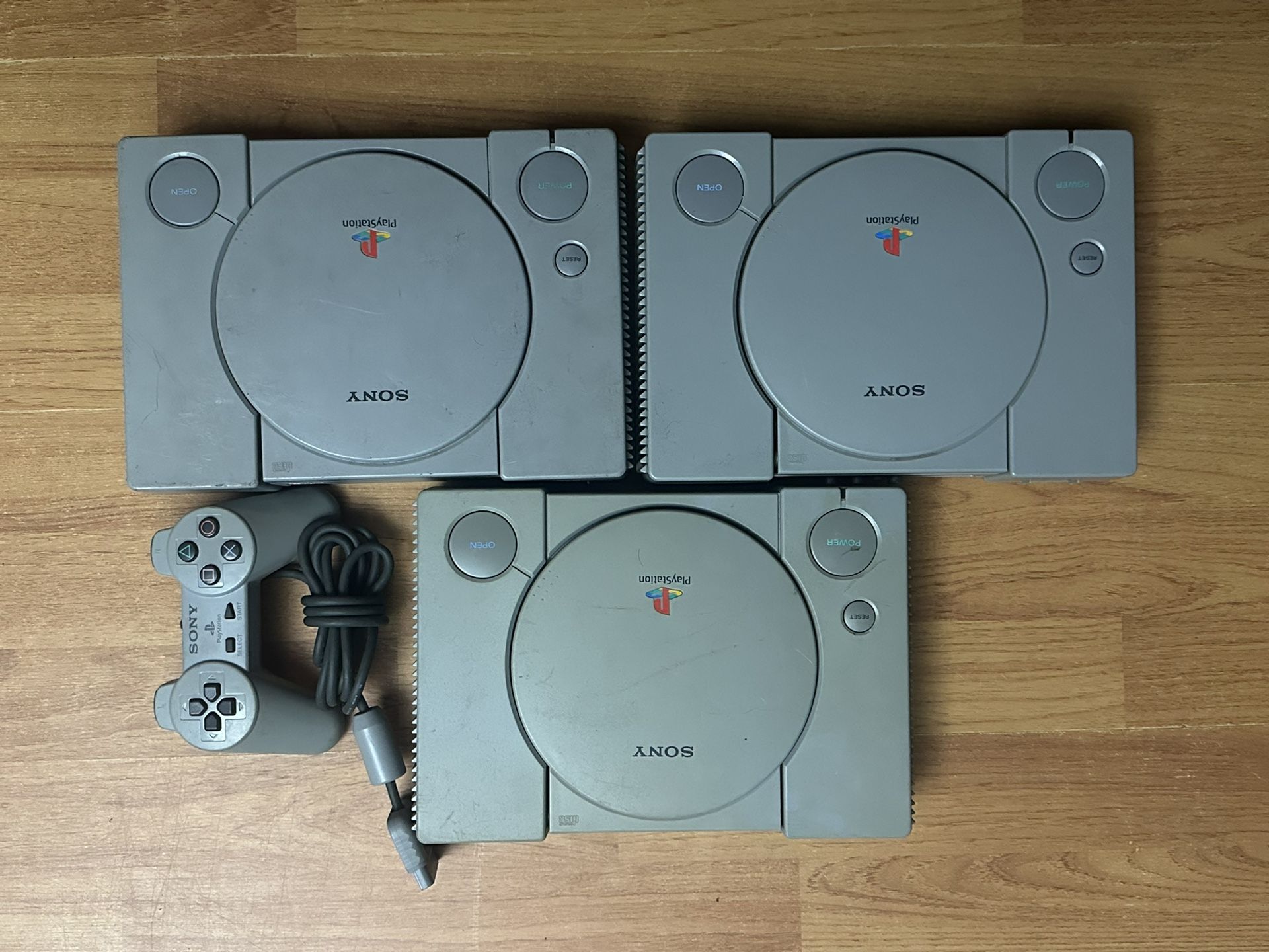 3 PS1 Consoles With One Remote( FOR REPAIR OR PARTS)