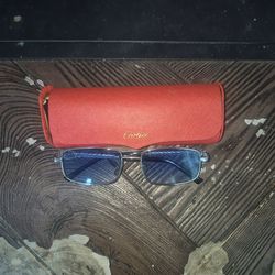 Cartier shade with a red case