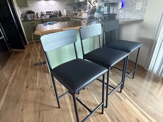 4 Black Counter-height chairs