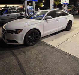Audi A6 White Sedan with Black Wheels
