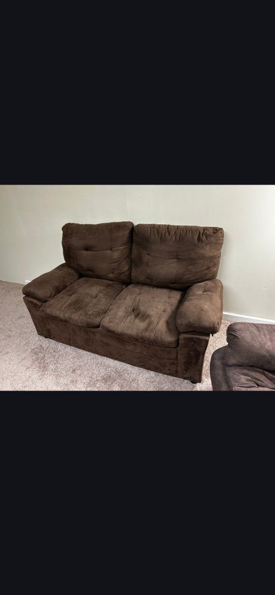 Brown couch love seat