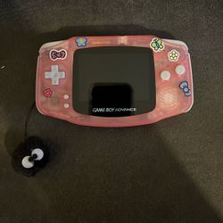 Modded Game Boy Advance with games and carry bag