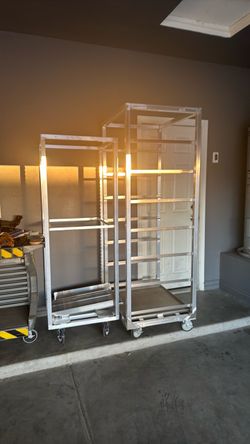 Aluminum racks new with wheels and locks on them