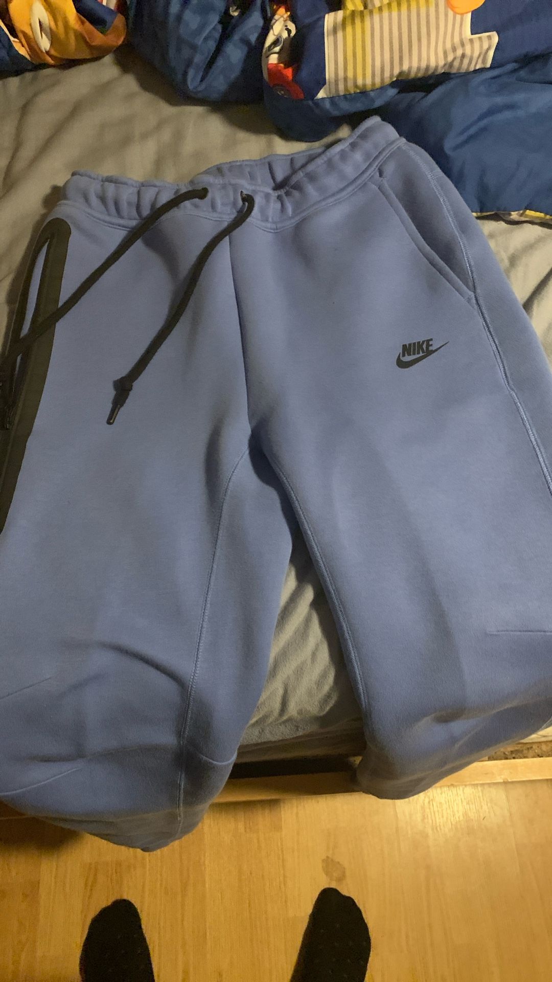 blue nike tech hoodie with it