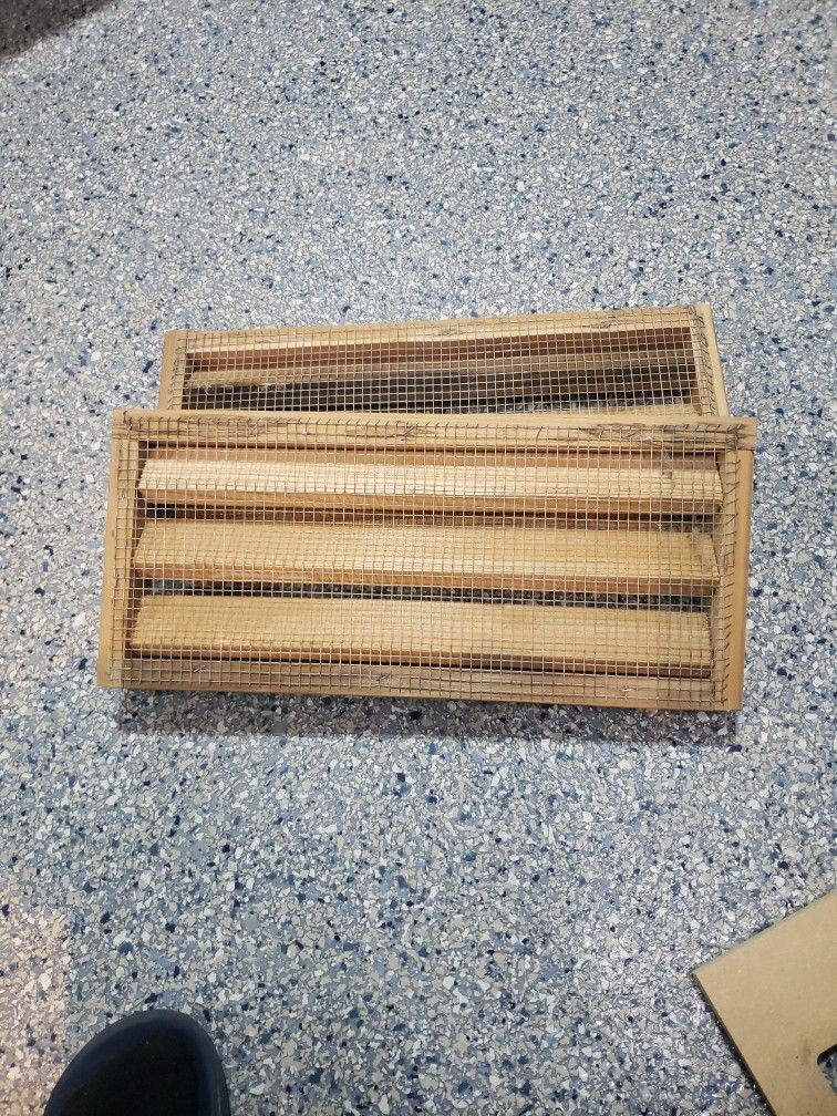 Two Wooden Foundation Vents