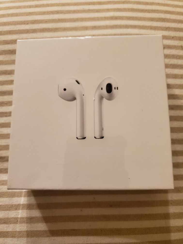 Apple Airpods. 1st generation with charging case. New in sealed box. $100.