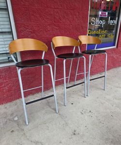 Set of 3 bar height stools, used and priced accordingly