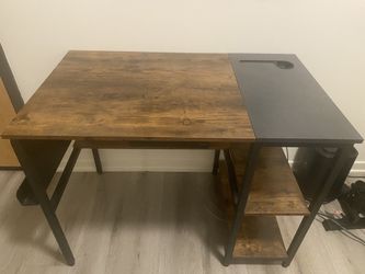 Brown and black desk with open shelves