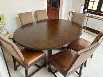 Dinning table. BERNHARDT FURTINURE